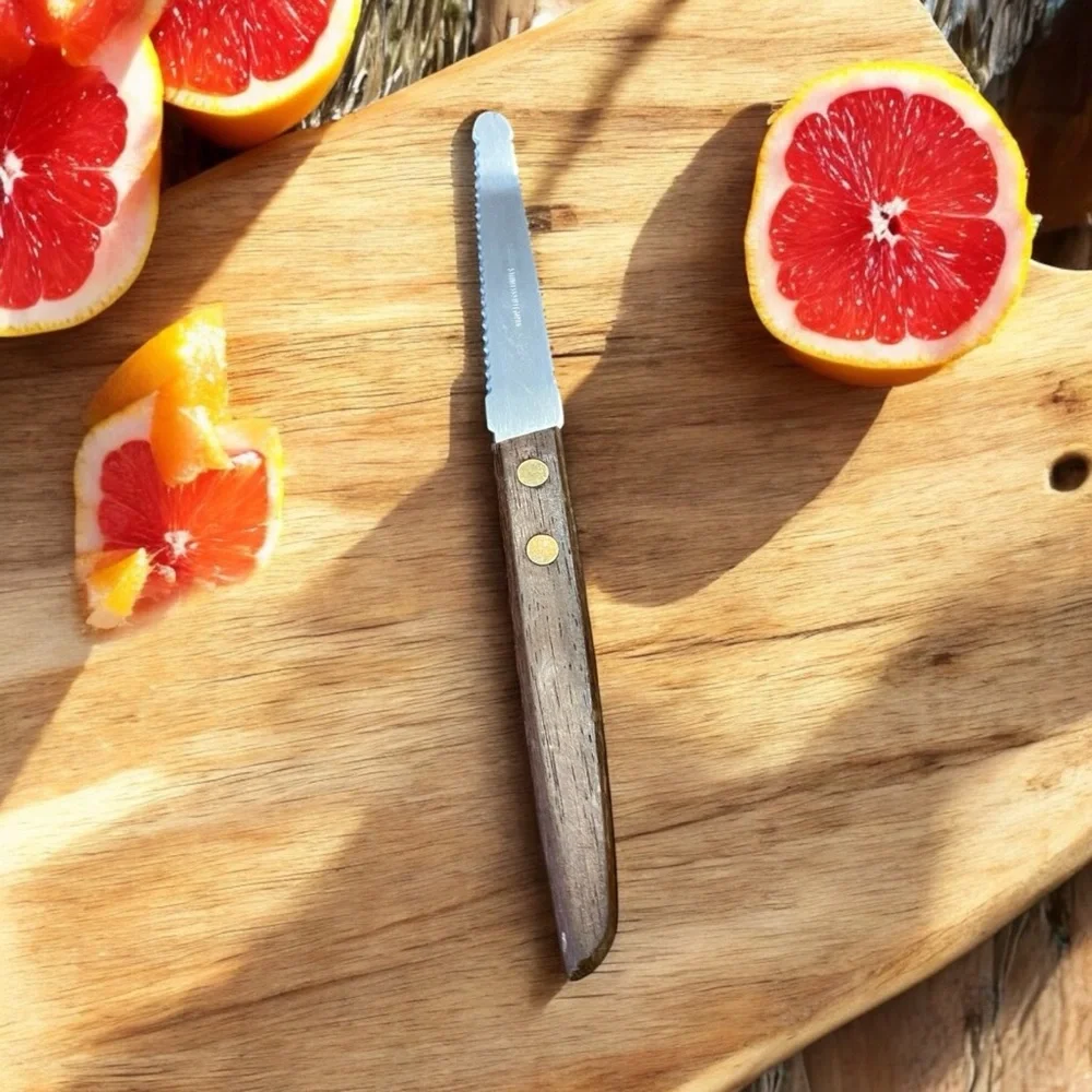 Vintage Geneva Forge stainless steel grapefruit knife.